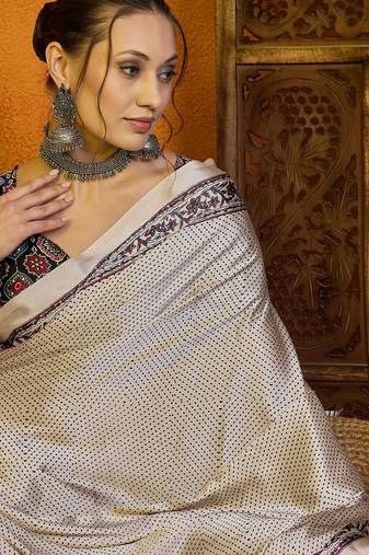 Cream ethnic motifs printed satin saree with blouse