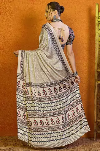 Cream ethnic motifs printed satin saree with blouse