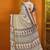 Cream ethnic motifs printed satin saree with blouse