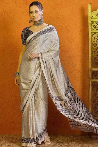 Cream ethnic motifs printed satin saree with blouse