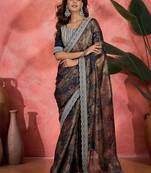 Blue lustrous floral printed embroidered silk saree with blouse