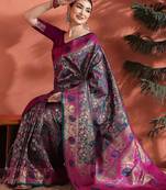 Pink woven design zari saree with unstitched blouse