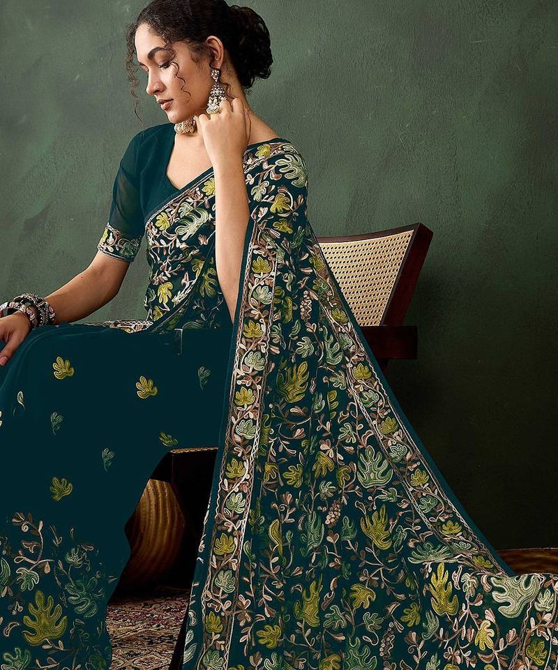 Teal embroidered saree with blouse piece