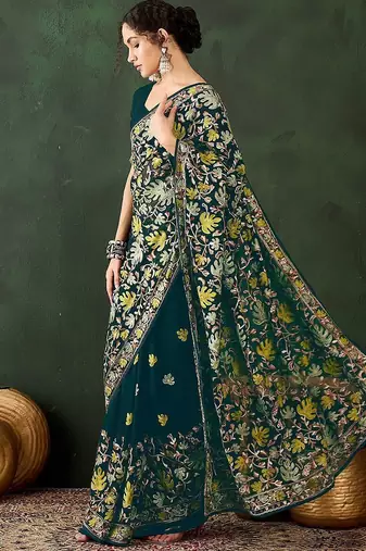Teal embroidered saree with blouse piece