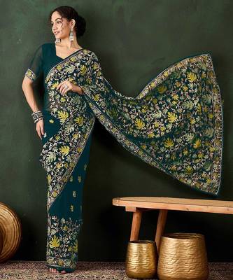 Teal embroidered saree with blouse piece 4