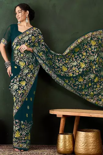 Teal embroidered saree with blouse piece