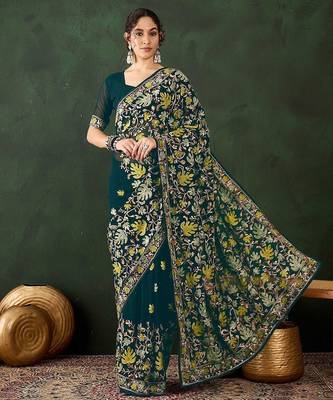 Teal embroidered saree with blouse piece 5