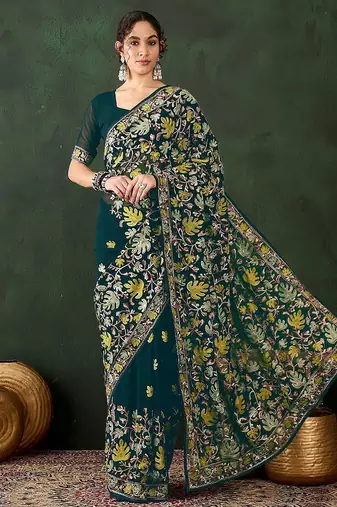 Teal embroidered saree with blouse piece