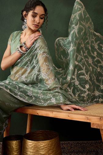 Sea green embroidered saree with blouse piece