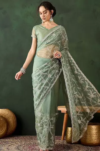 Sea green embroidered saree with blouse piece