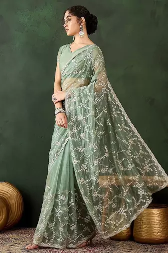 Sea green embroidered saree with blouse piece