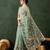 Sea green embroidered saree with blouse piece