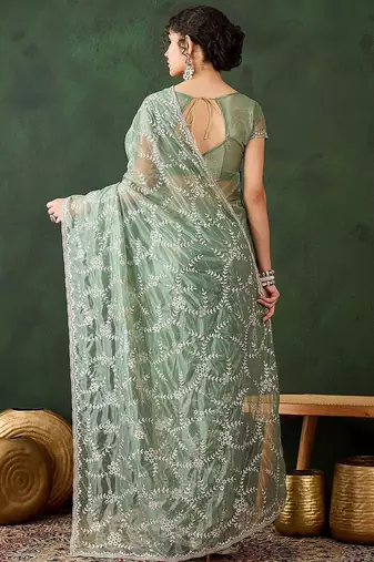 Sea green embroidered saree with blouse piece