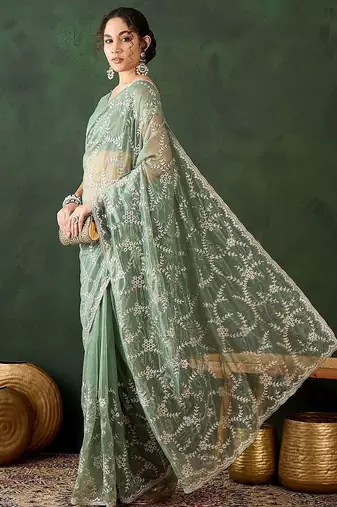 Sea green embroidered saree with blouse piece