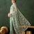 Sea green embroidered saree with blouse piece