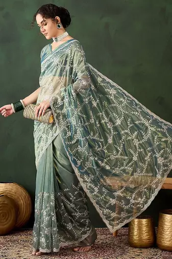Teal ethnic motif embroidered saree with blouse piece