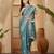 Teal floral embroidered sequinned saree