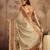 Cream motifs printed saree with unstitched blouse