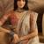 Cream motifs printed saree with unstitched blouse