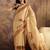 Beige printed patola saree with unstitched blouse piece