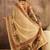 Beige printed patola saree with unstitched blouse piece