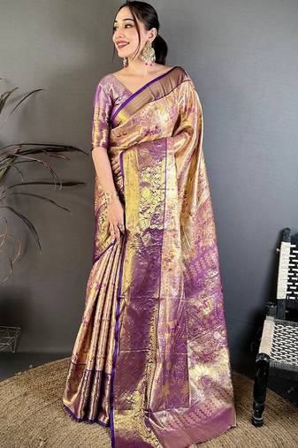 Gold woven design zari silk blend kanjeevaram saree with blouse piece