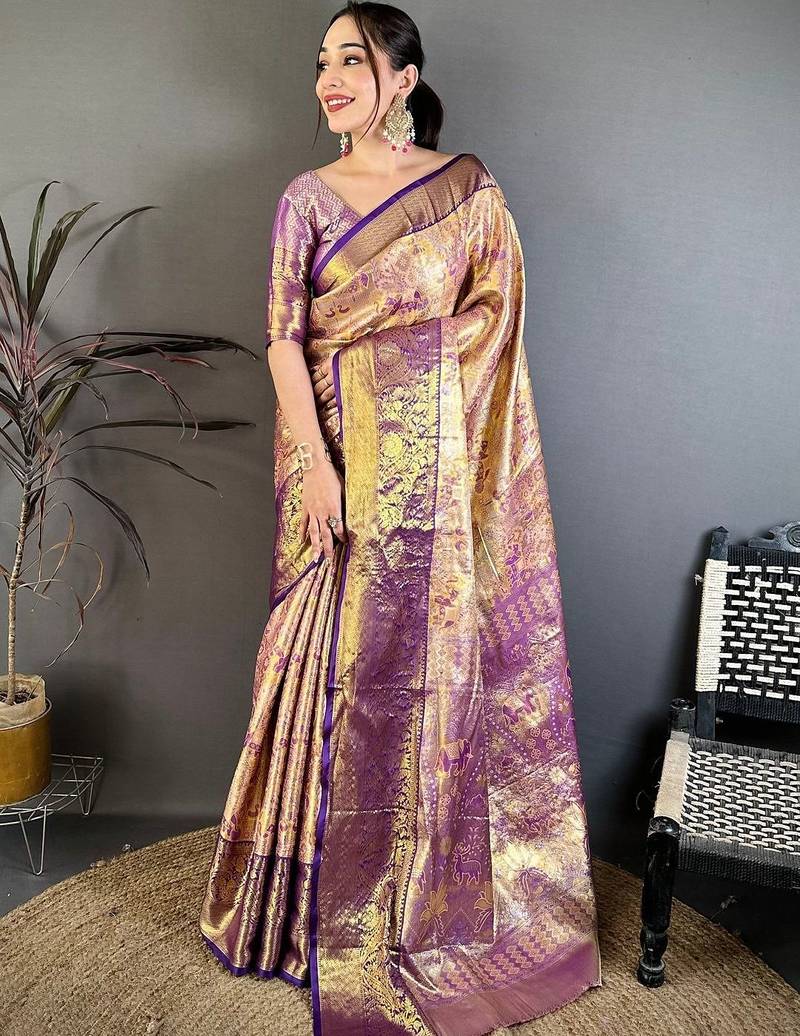 Gold woven design zari silk blend kanjeevaram saree with blouse piece