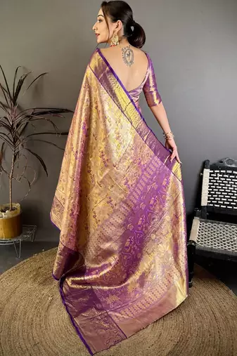 Gold woven design zari silk blend kanjeevaram saree with blouse piece