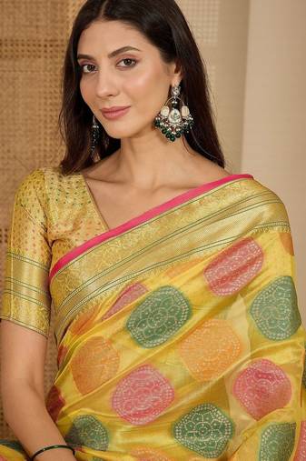 Yellow woven design zari saree