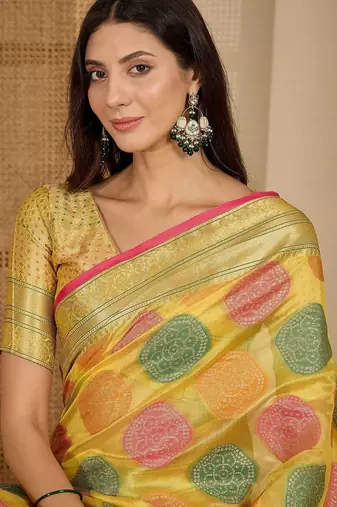 Yellow woven design zari saree