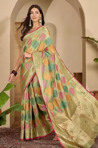 Green ethnic motifs woven design zari organza saree