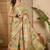 Green ethnic motifs woven design zari organza saree