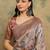 Beige ethnic motifs printed thread work silk cotton tussar saree with blouse
