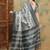 Grey warli printed silk cotton tussar saree with matching blouse