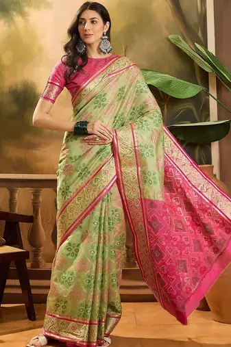 Green woven design floral patola saree