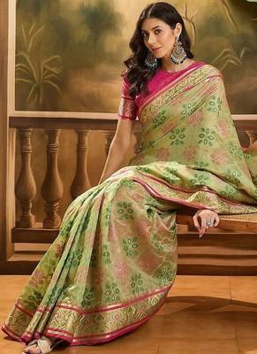 Green woven design floral patola saree 5