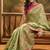 Green woven design floral patola saree