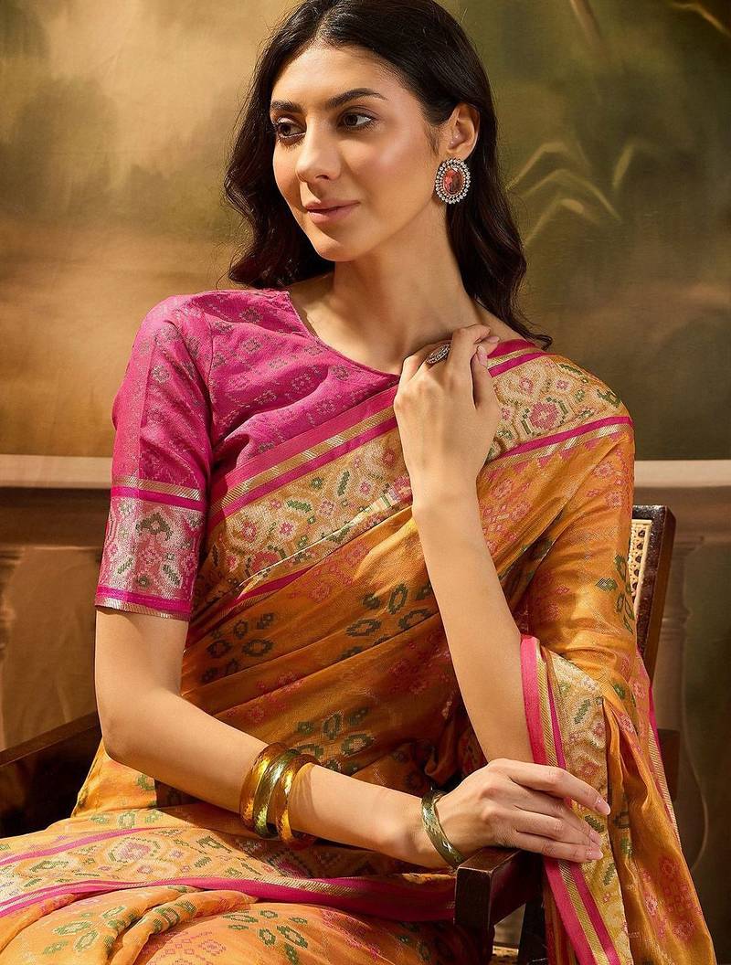Mustard floral woven design patola saree with blouse piece