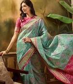 Blue woven design organza patola saree