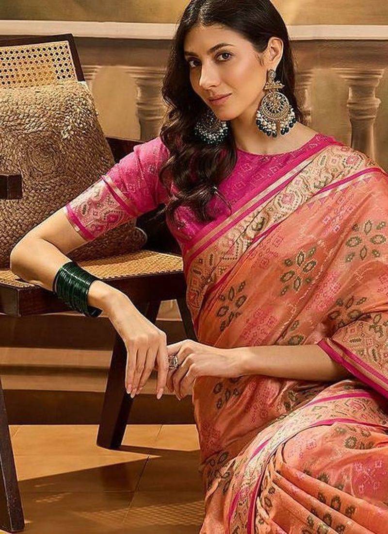 Peach ethnic motifs woven design patola saree