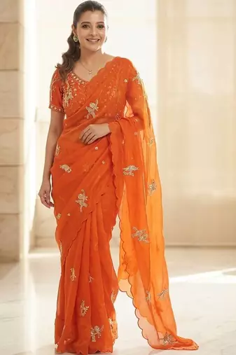 Orange ethnic motifs embroidered satin heavy work saree
