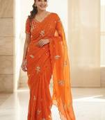 Orange ethnic motifs embroidered satin heavy work saree