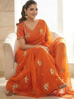 Orange ethnic motifs embroidered satin heavy work saree 4