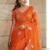 Orange ethnic motifs embroidered satin heavy work saree