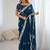 Teal embellished party wear saree with matching blouse
