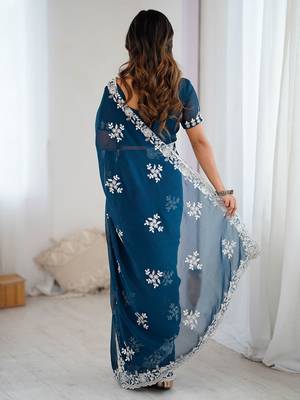 Teal embellished party wear saree with matching blouse 2