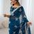 Teal embellished party wear saree with matching blouse