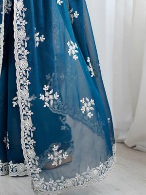 Teal embellished party wear saree with matching blouse 5