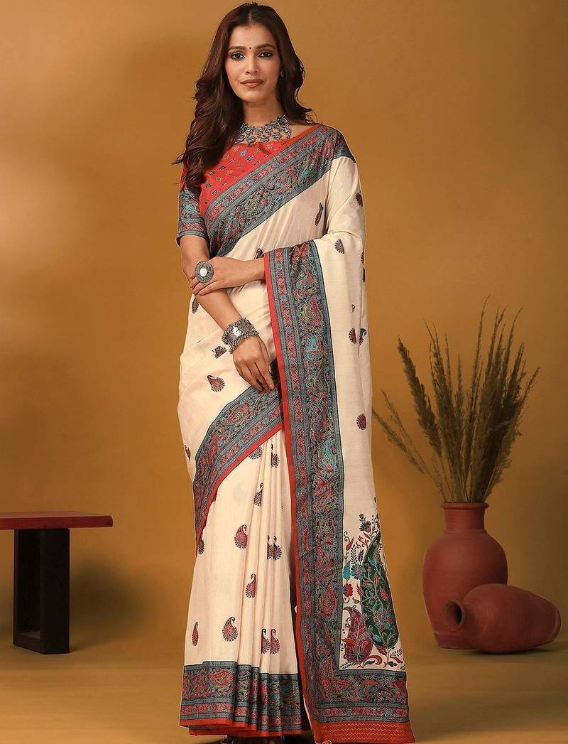 Off white paisley printed banarasi saree with unstitched blouse piece