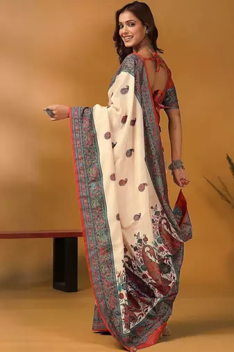 Off white paisley printed banarasi saree with unstitched blouse piece